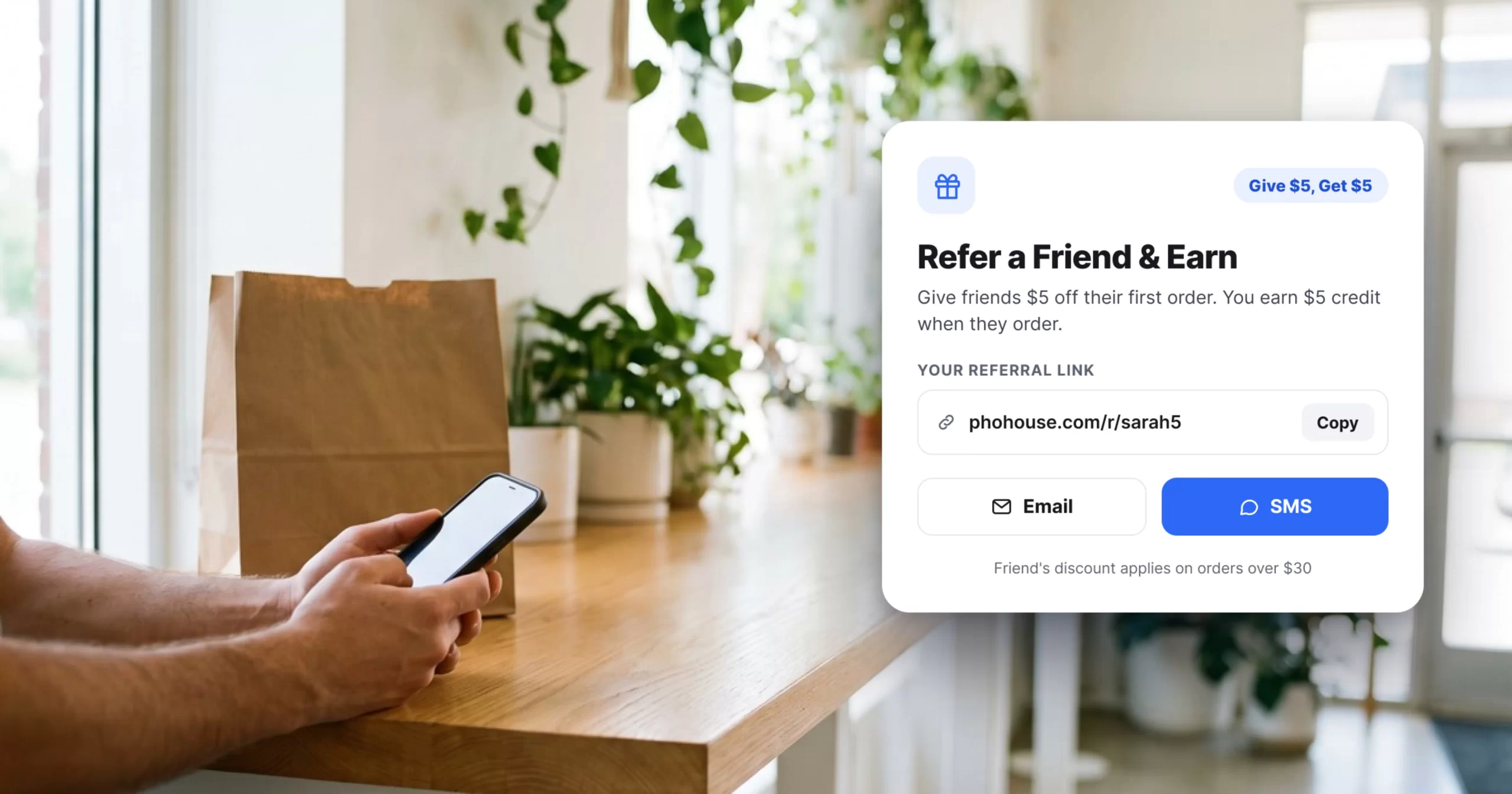 The Refer a Friend share box on an Innowi online ordering page, with the customer’s referral link and Email and SMS options